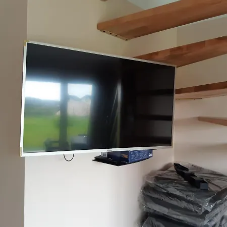 Puszek بيت خشبي