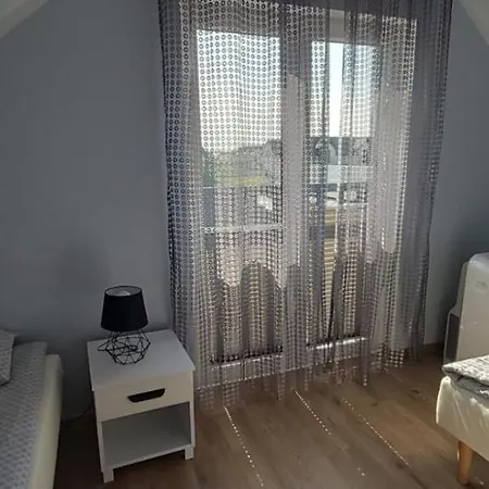 Puszek بيت خشبي