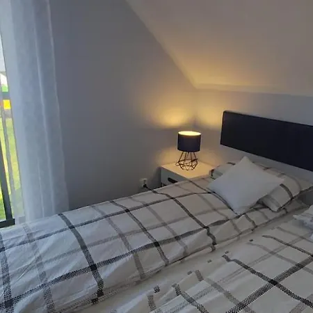 بيت خشبي Puszek