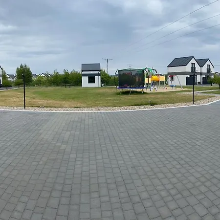 Puszek بيت خشبي *