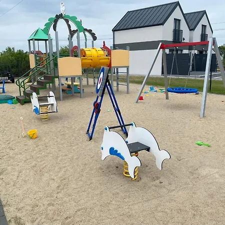 Puszek بيت خشبي